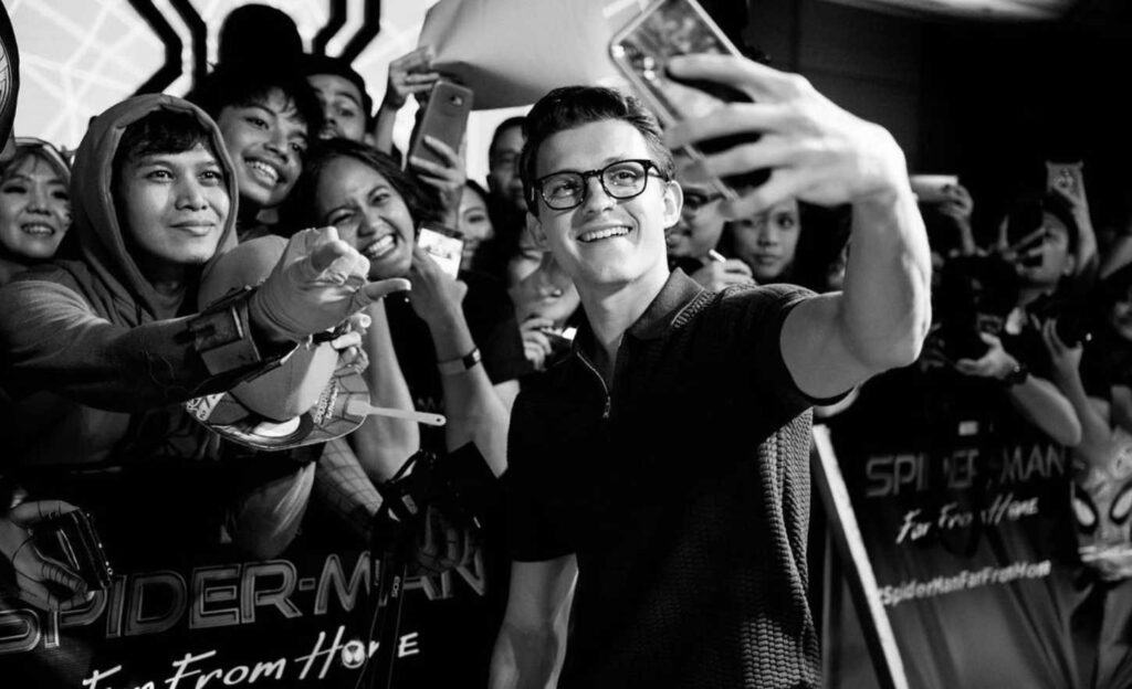 Tom Holland taking selfie