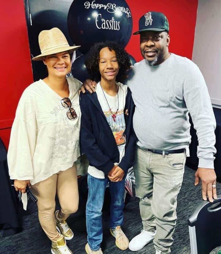 Bobby Brown posing with family