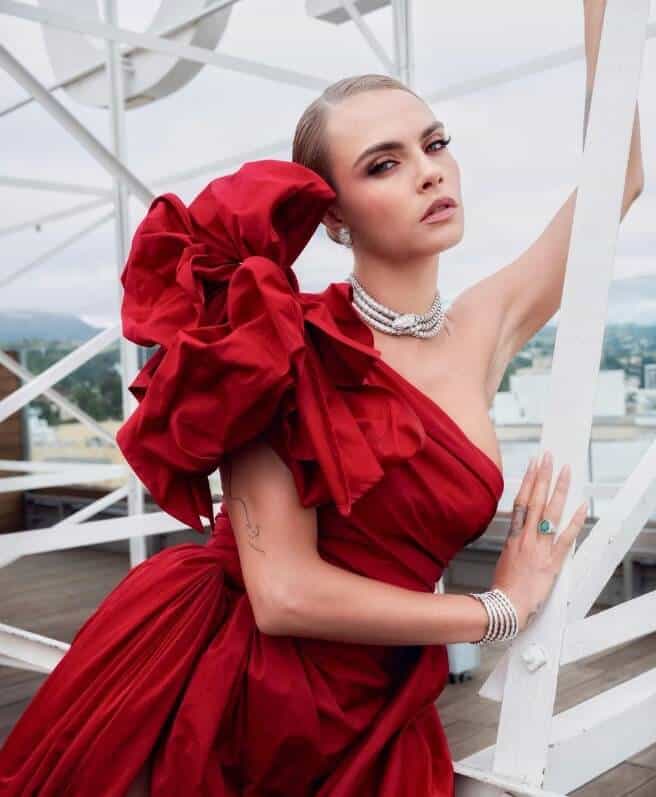 Cara Delevingne wearing red outfit