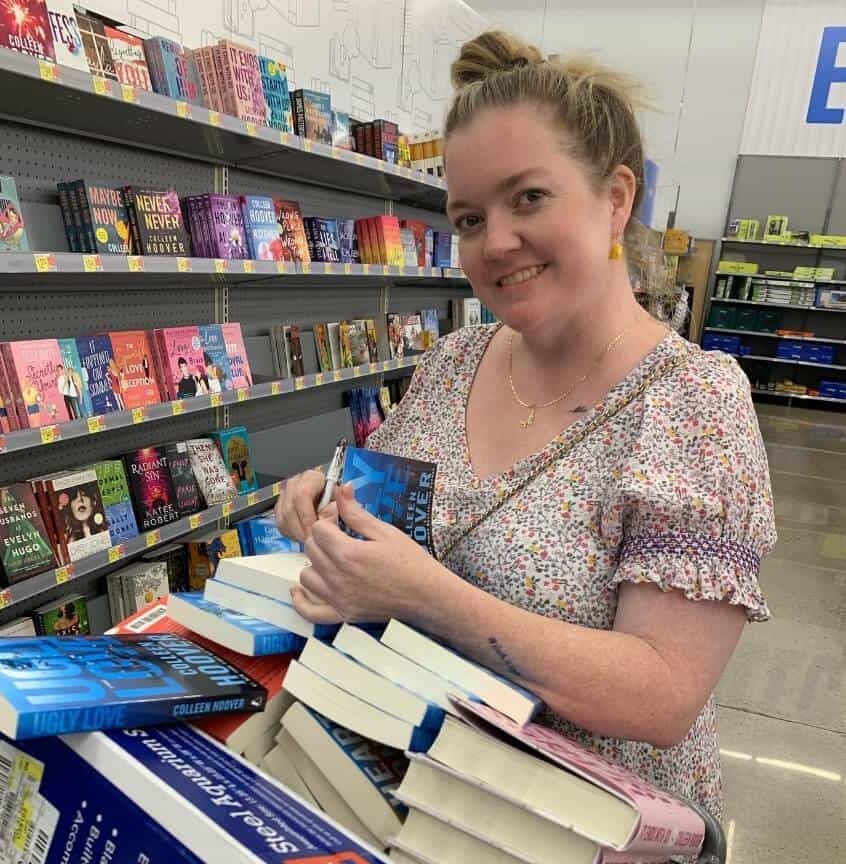 Colleen Hoover signing books