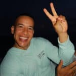 Daddy Yankee showing victory sign