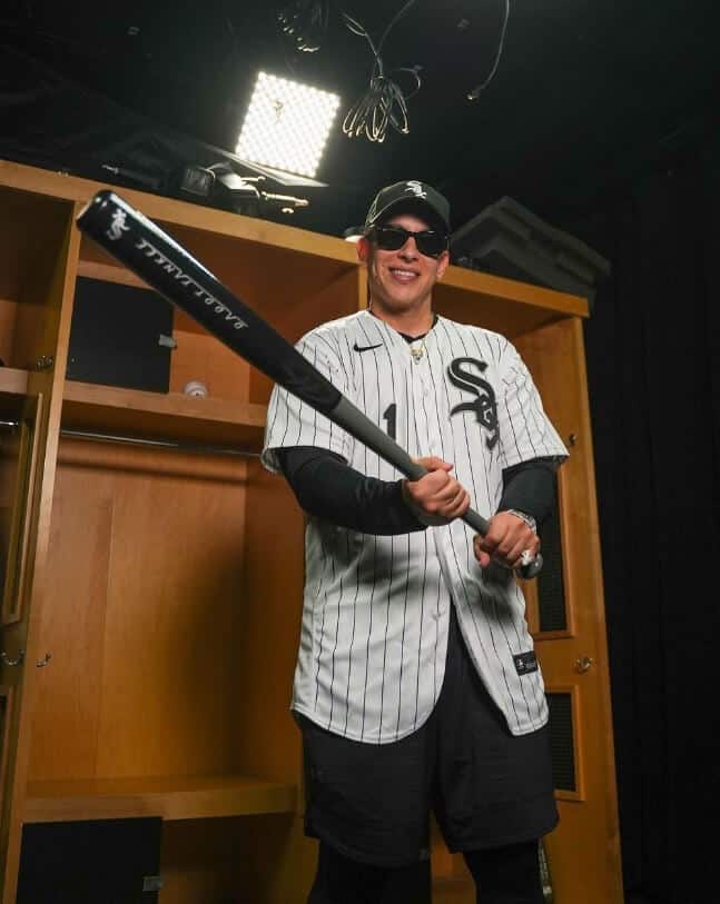 Daddy Yankee with baseball bat