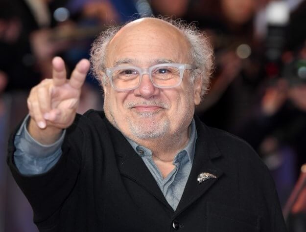 Danny DeVito showing victory sign