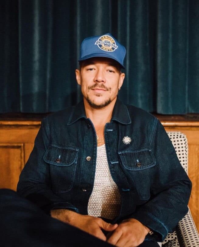 Diplo wearing blue cap