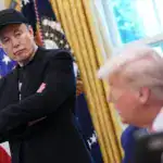 Elon Musk Says He Warned Donald Trump To Drop Tariffs Over Fears of Job Losses: 'President Loves Tariffs, I've Tried To Dissuade Him' GettyImages-2217852297-e1764694086460