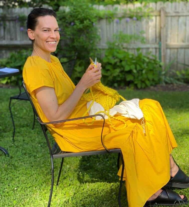 Hilary Swank knitting in summer vocation