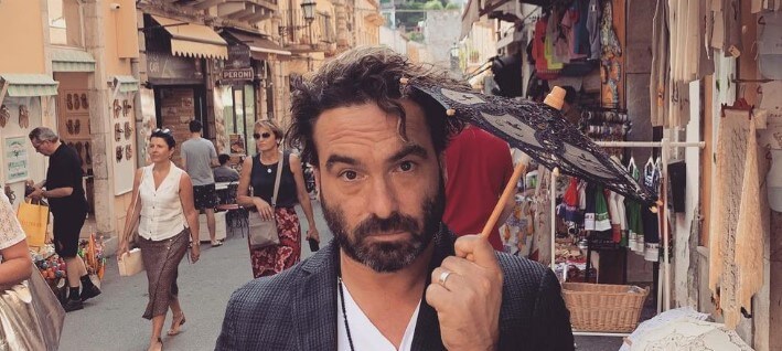 Johnny Galecki traveling world