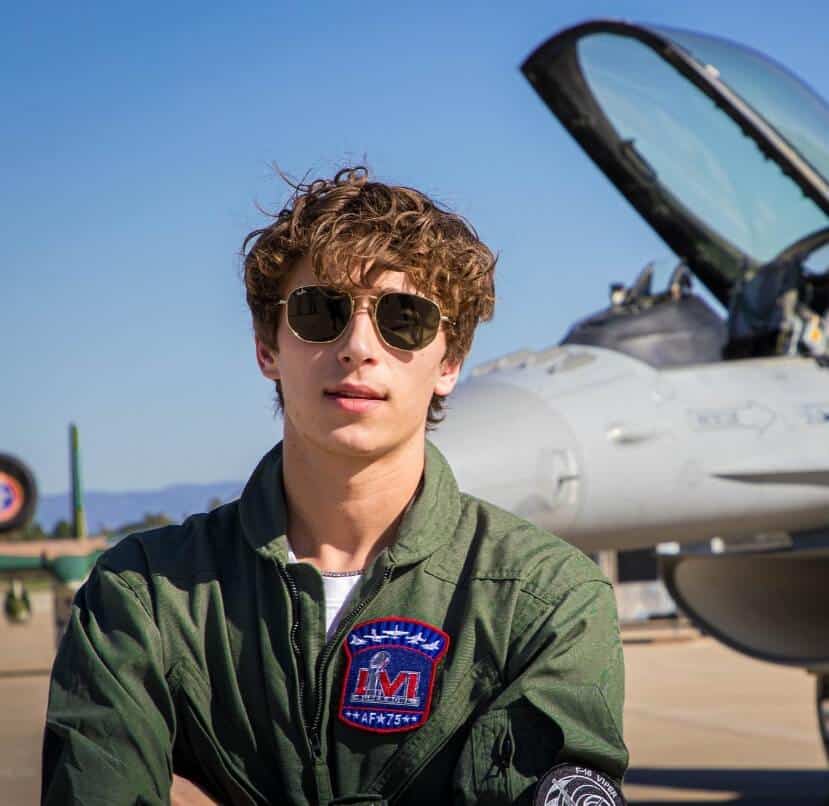 Josh Richards posing with airforce jet