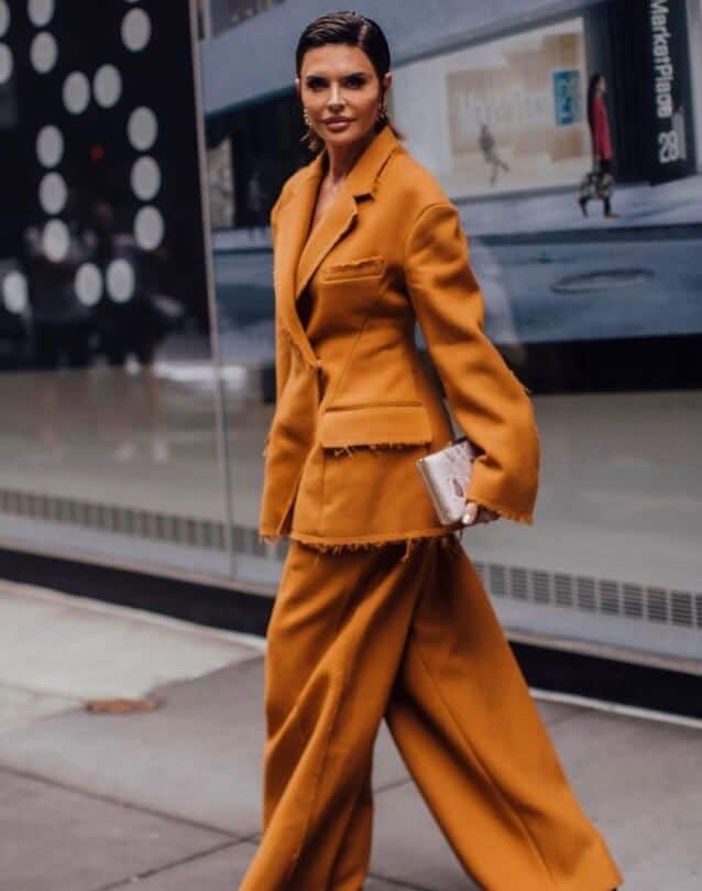 Lisa Rinna wearing orange outfit