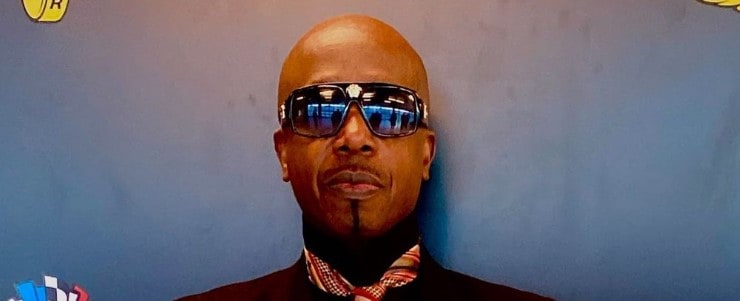 MC Hammer wearing black goggles