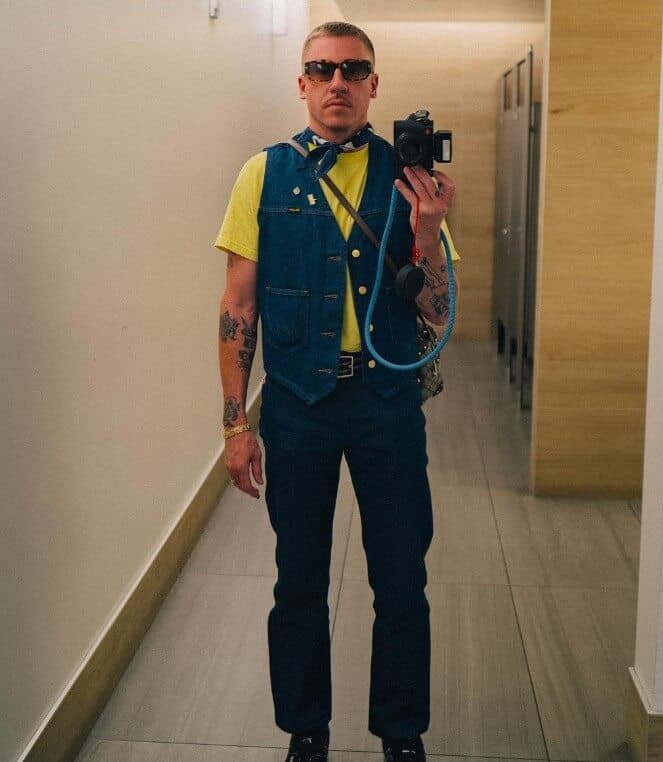 Macklemore taking selfie with camera