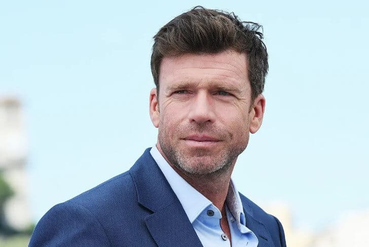 Taylor Sheridan wearing blue coat