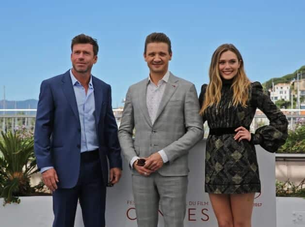 Taylor Sheridan with Jeremy Renner and Elizabeth Olsen