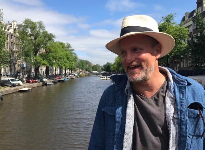 Woody Harrelson traveling over river