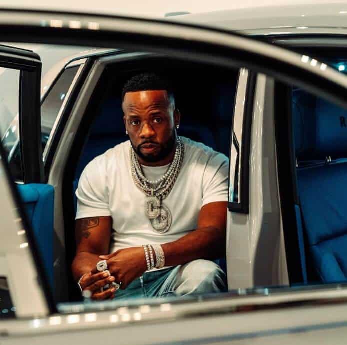 Yo Gotti sitting in car