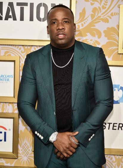 Yo Gotti wearing formals